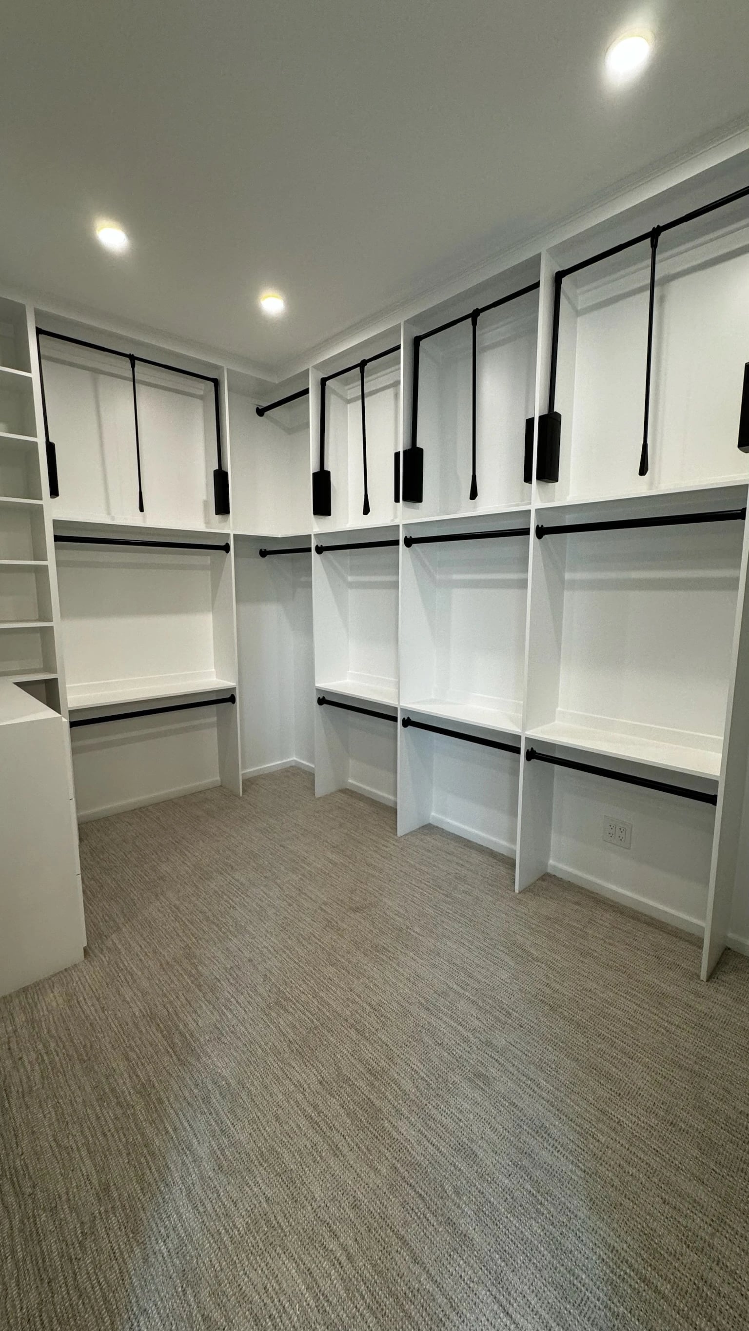 White custom closet shelving and hanging rods